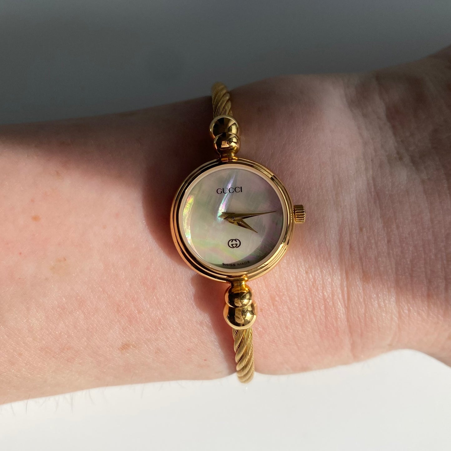 Gucci 1990s Seashell Dial Gold Plated Cable Bangle Watch