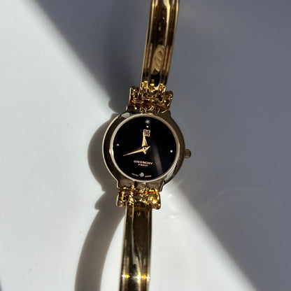 Givenchy 1990s Black Round Dial Gold Plated Bangle Watch