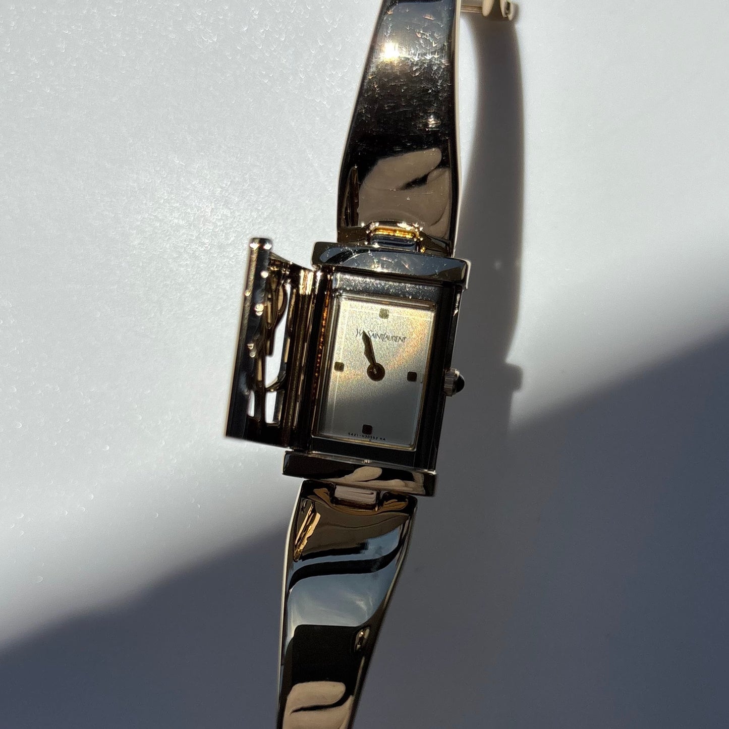 Yves Saint Laurent 1990s Peek-A-Boo Gold Plated Bangle Watch