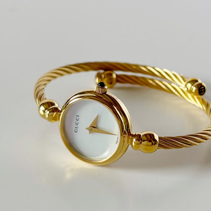 Gucci 1990s Seashell Dial Gold Plated Cable Bangle Watch