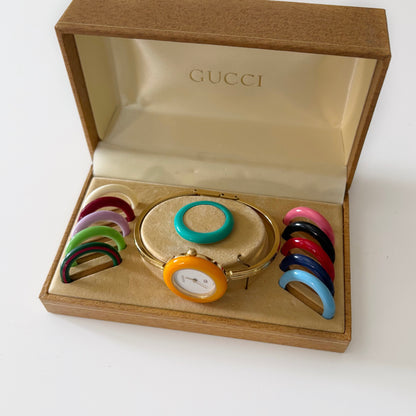 Gucci 1990s Interchangeable Bezel Gold Plated Bangle Watch with 12 bezels, Case