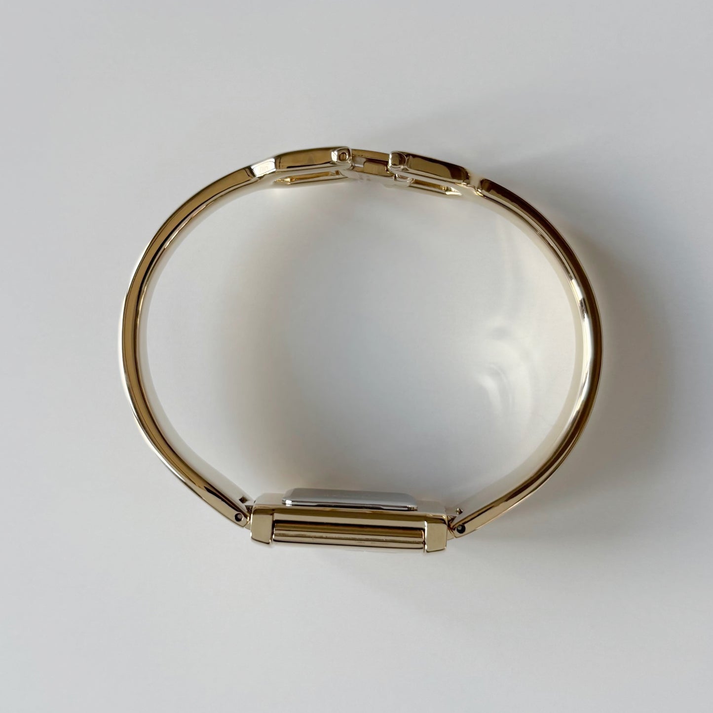 Yves Saint Laurent 1990s Peek-A-Boo Gold Plated Bangle Watch