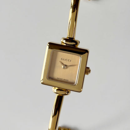 Gucci 1990s Square Dial Gold Plated Bangle Watch