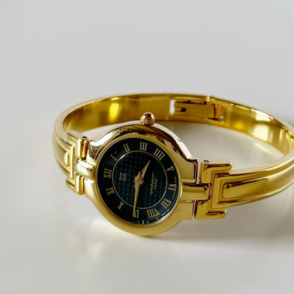 Givenchy 1990s Round Dial Gold Plated Bangle Watch