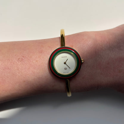 Gucci 1990s Interchangeable Bezel Gold Plated Bangle Watch with 12 bezels, case