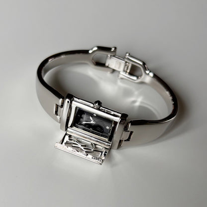 Yves Saint Laurent 1990s Black Dial Silver Bangle Watch