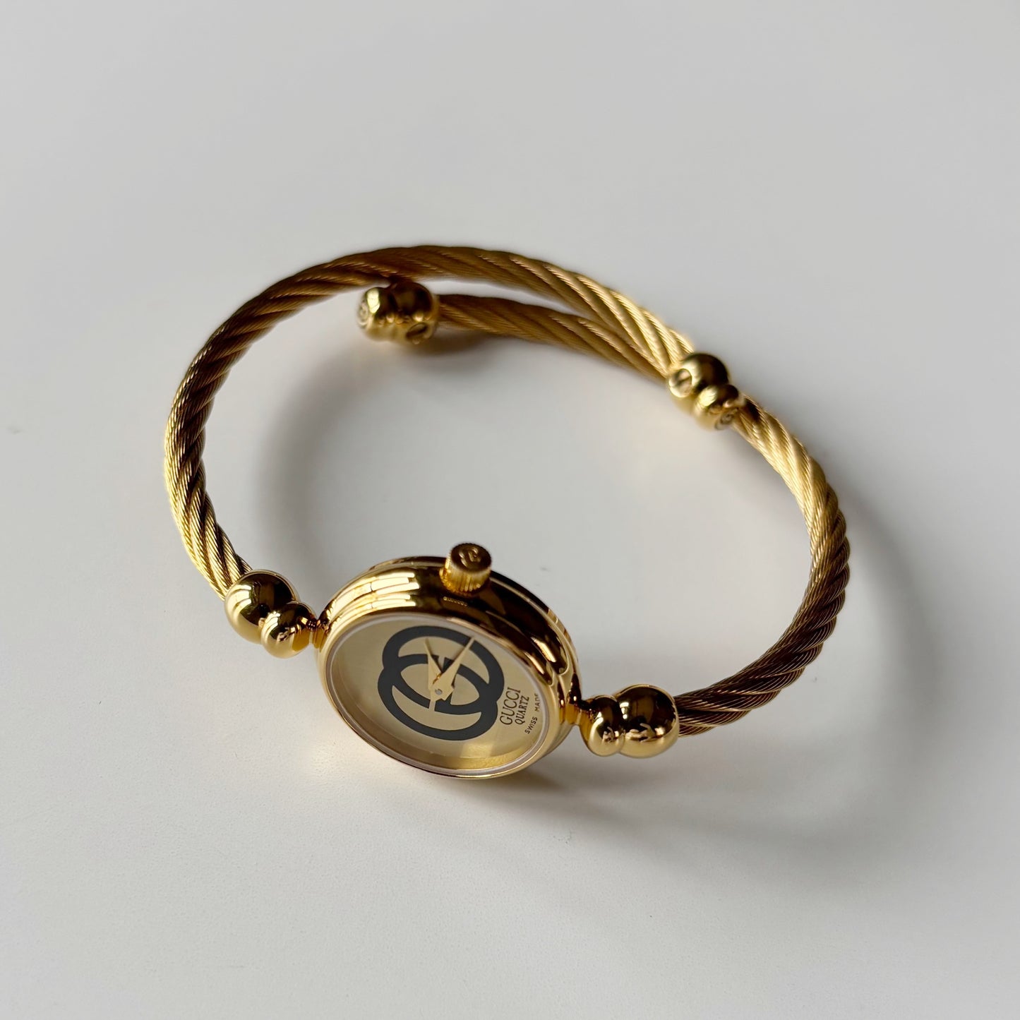 Gucci 1980s Round Dial Cable Band Bangle Watch