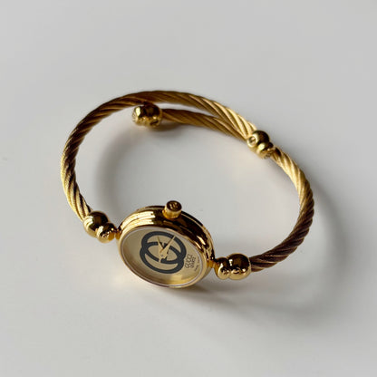Gucci 1980s Round Dial Cable Band Bangle Watch