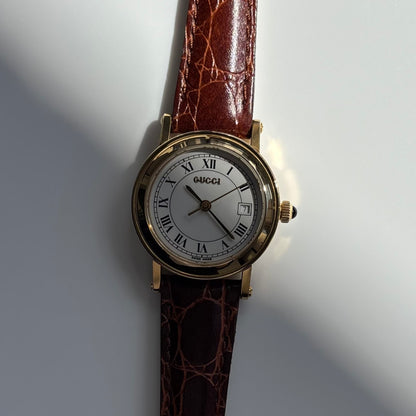 Gucci 1990s Date Round Dial Gold-Plated Watch