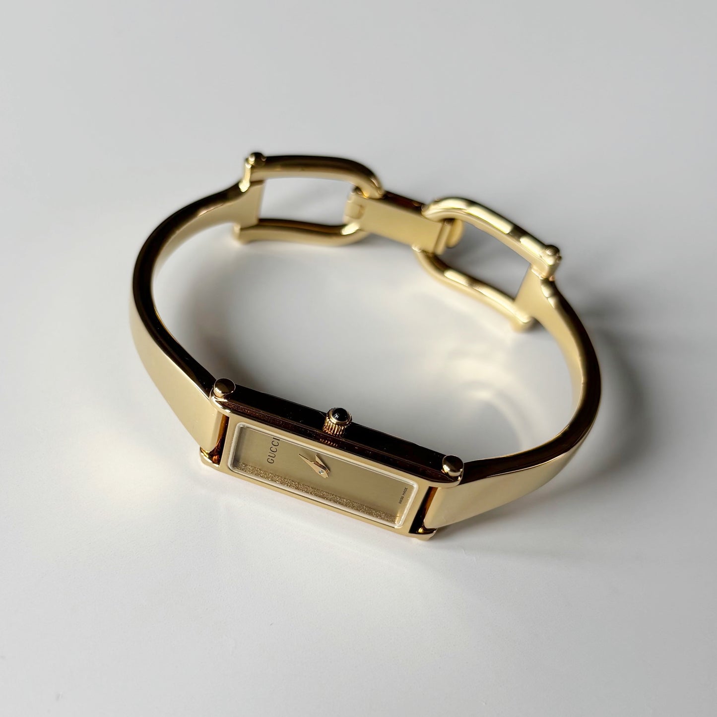 Gucci 1990s Gold Rectangular Dial Gold Plated Bangle Watch