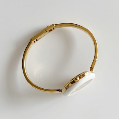 Gucci 1990s Interchangeable Bezel Gold Plated Watch with 12 bezels, case (Small)