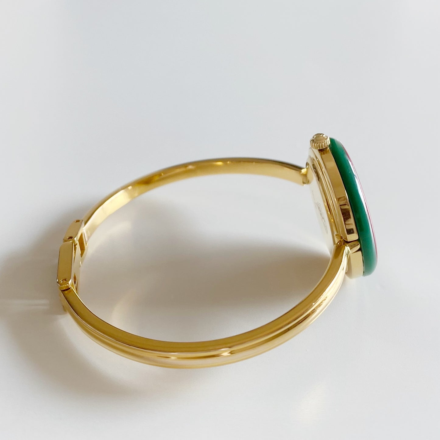 Gucci 1990s Interchangeable Bezel Gold Plated Bangle Watch with 12 bezels, case