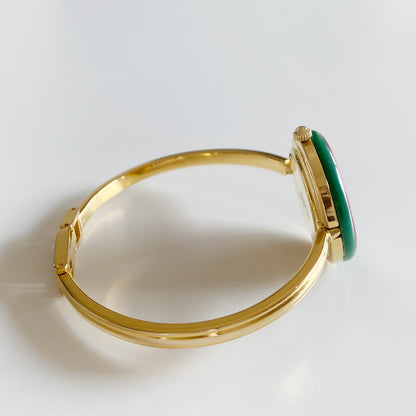Gucci 1990s Interchangeable Bezel Gold Plated Bangle Watch with 12 bezels, case