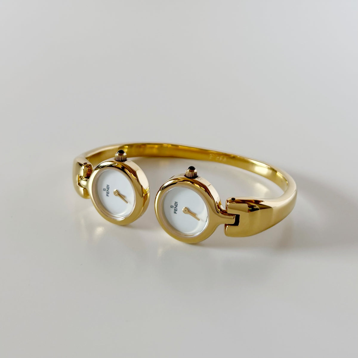 Fendi 1990s Seashell Dial Two Time Zone Gold Plated Bangle Watch