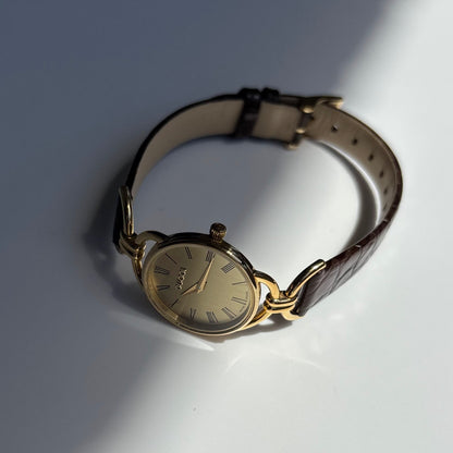 Gucci 1990s Gold Round Dial Horsebit Gold Plated Watch