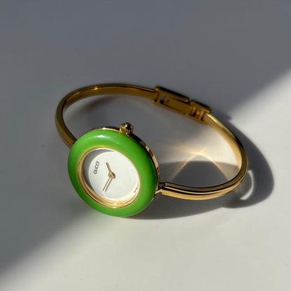 Gucci 1990sInterchangeable Bezel Gold Plated Bangle Watch with 12 bezels, case