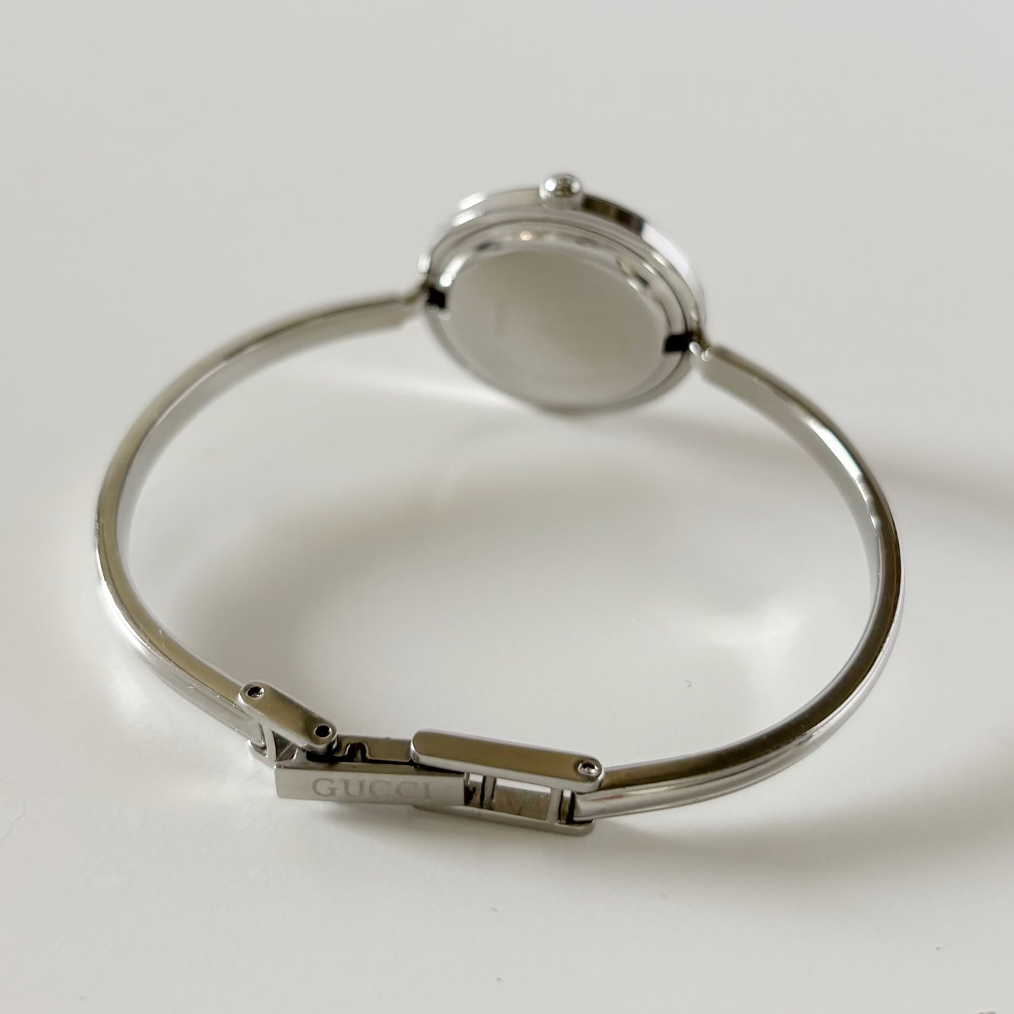 Gucci 1990s Interchangeable Bezel Stainless steel Bangle Watch with 12 bezels, case