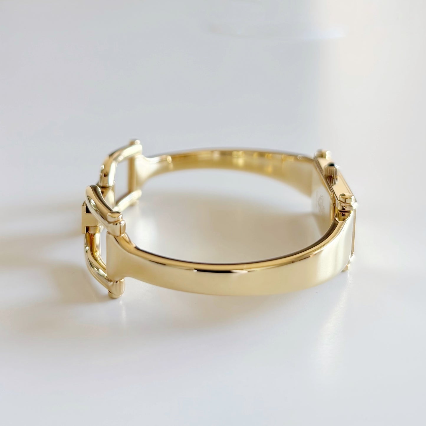 Gucci 1990s Rectangular Dial Gold Plated Bangle Watch