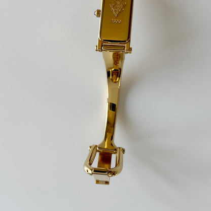 Gucci 1990s Rectangular Gold Dial Gold Plated Bangle Watch