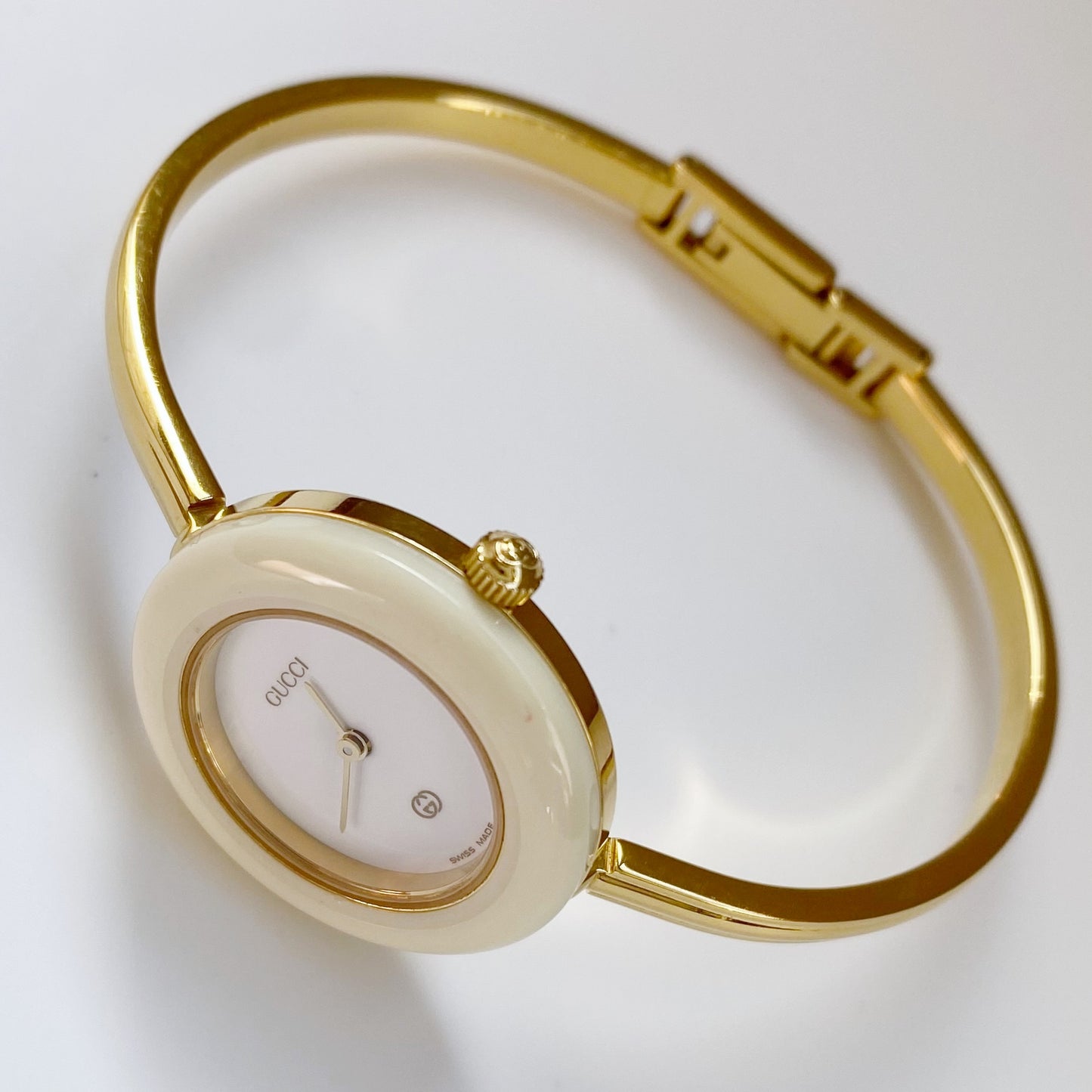 Gucci 1990s Interchangeable Bezel Gold Plated Bangle Watch with 12 bezels, case