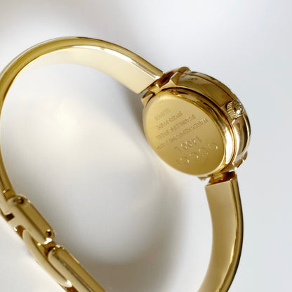 Gucci 1990s Round Dial Gold Plated Bangle Watch