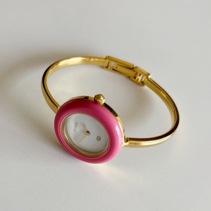 Gucci 1990s Interchangeable Bezel Gold Plated Bangle Watch with 12 bezels, case (Small)