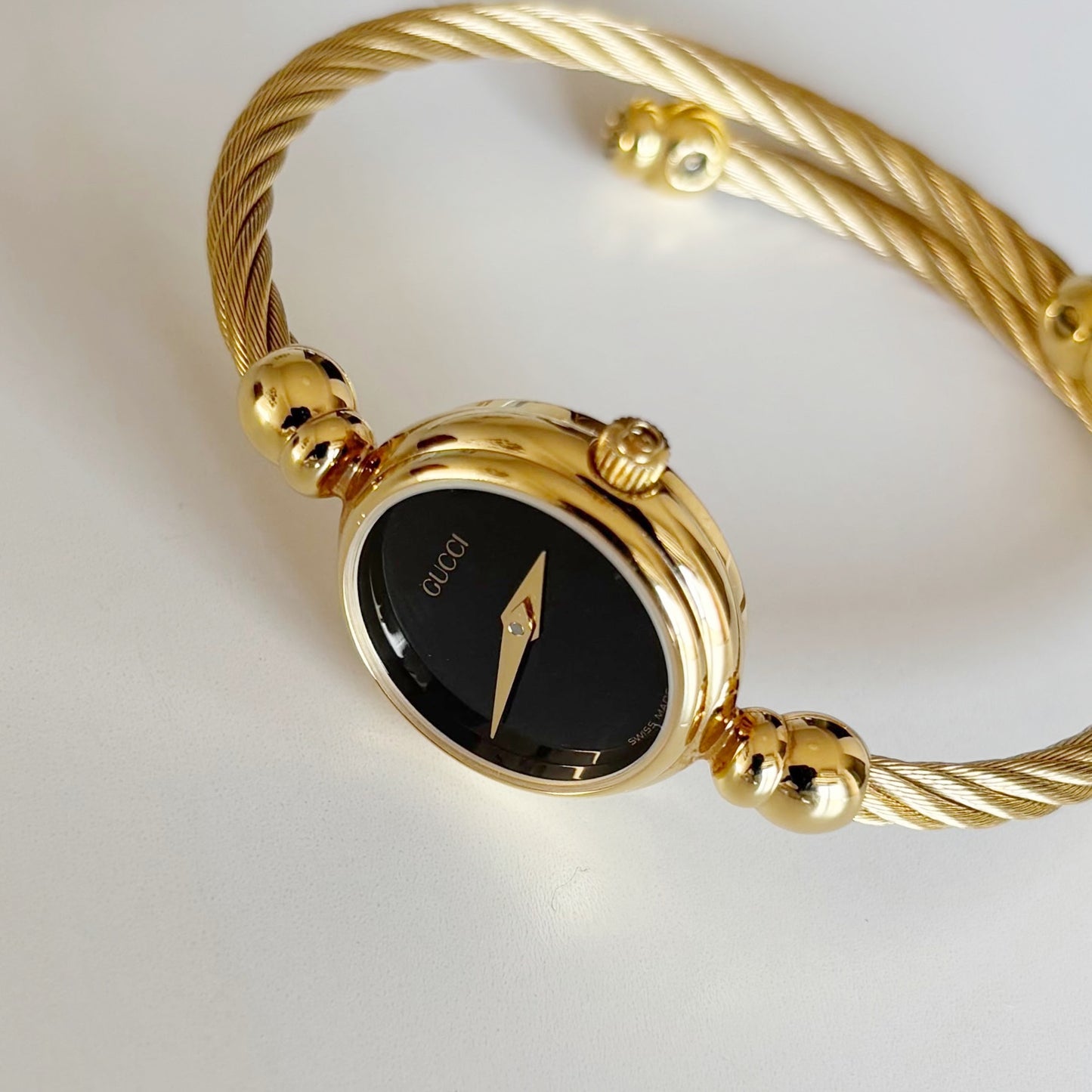 Gucci 1990s Black Dial Gold Plated Cable Bangle Watch