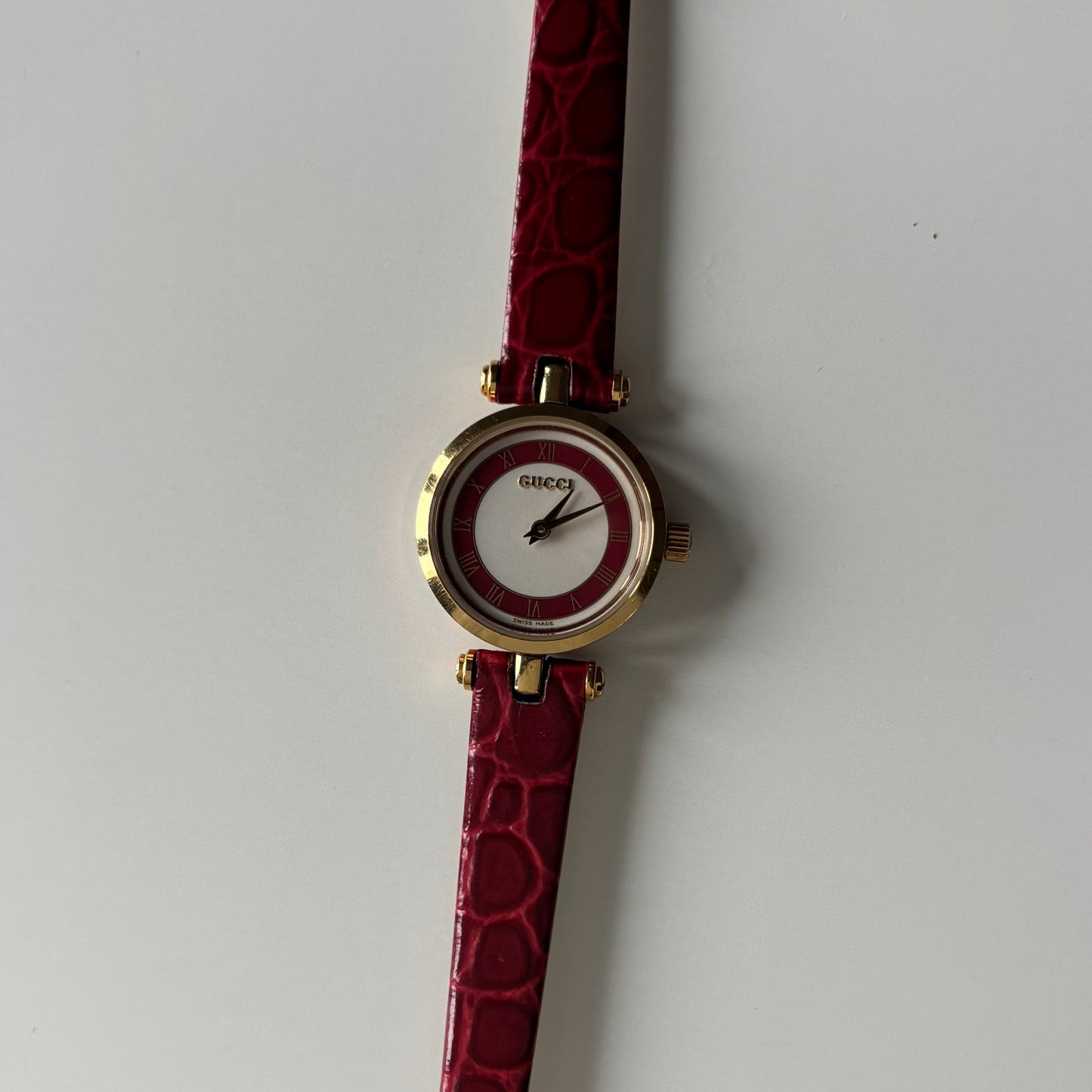 Gucci 1990s Red Dial Sherry Gold Plated Watch