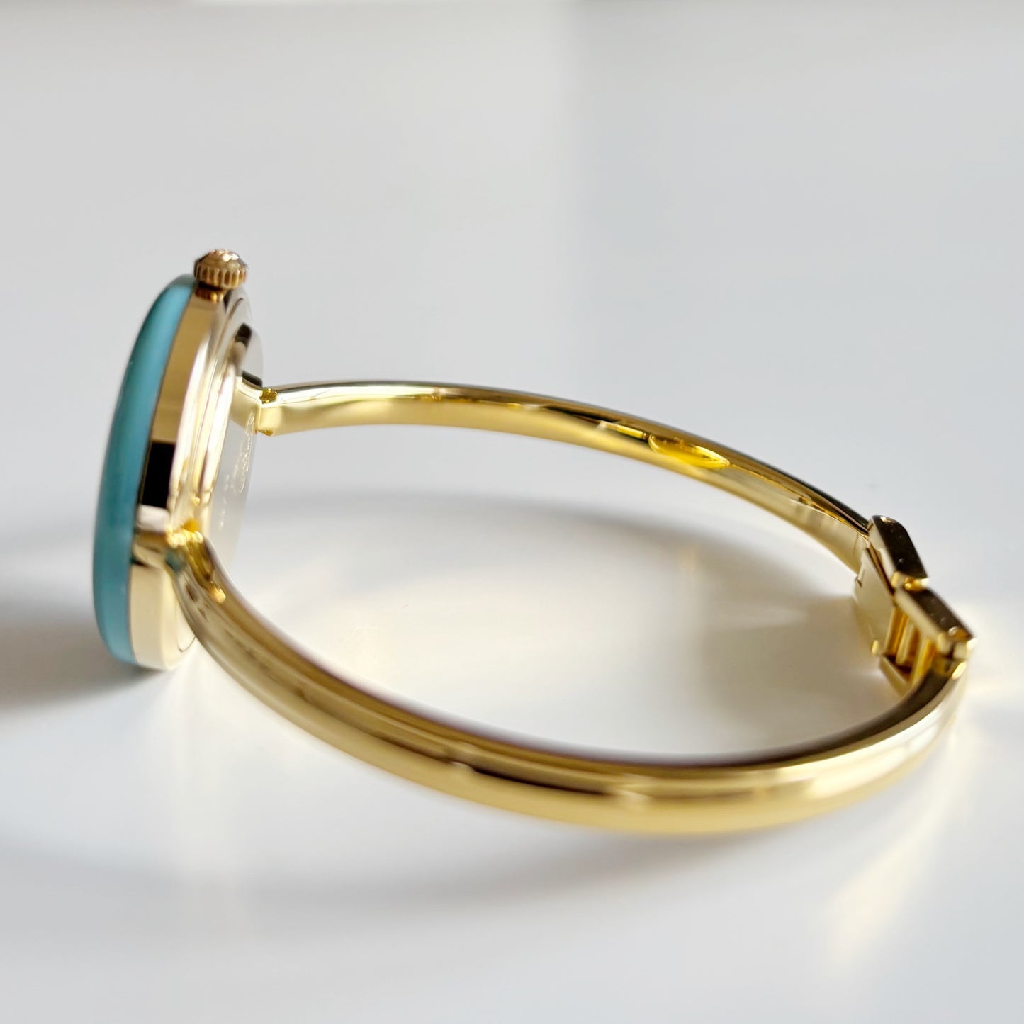 Gucci 1990s Interchangeable Bezel Gold Plated Bangle Watch with 12 bezels, case