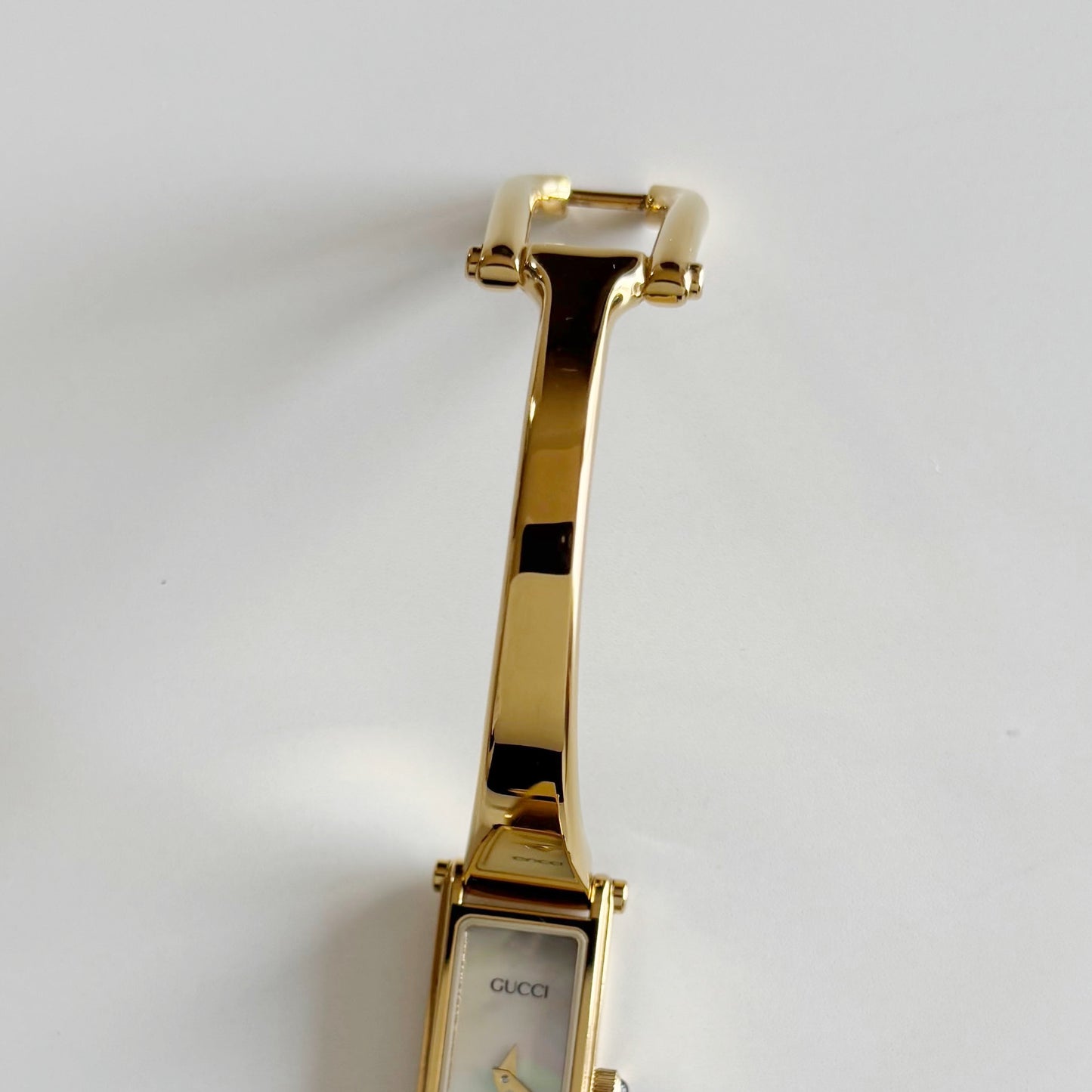 Gucci 1990s Seashell Dial Rectangular Gold Plated Bangle Watch