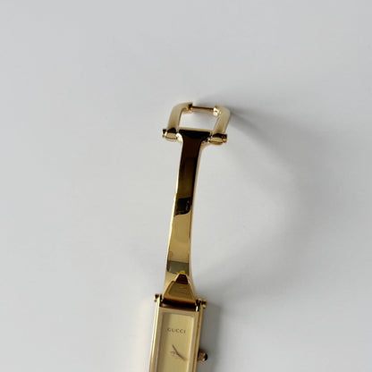 Gucci 1990s Gold Rectangular Dial Gold Plated Bangle Watch