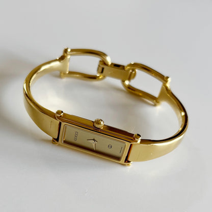 Gucci 1980s Rectangular Gold Dial Gold Plated Bangle Watch