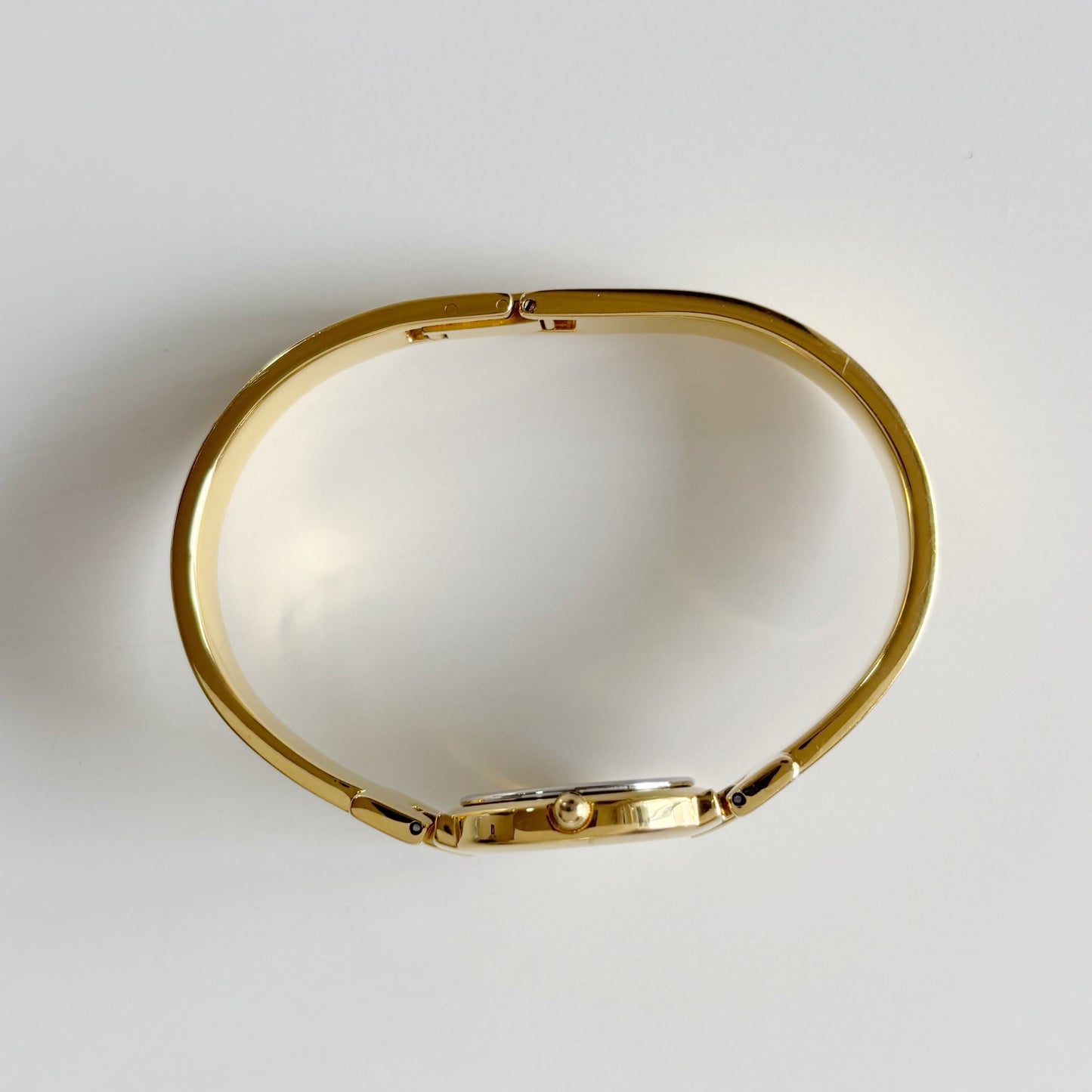 Givenchy 1990s Round Dial Gold Plated Bangle Watch