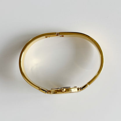 Givenchy 1990s Round Dial Gold Plated Bangle Watch