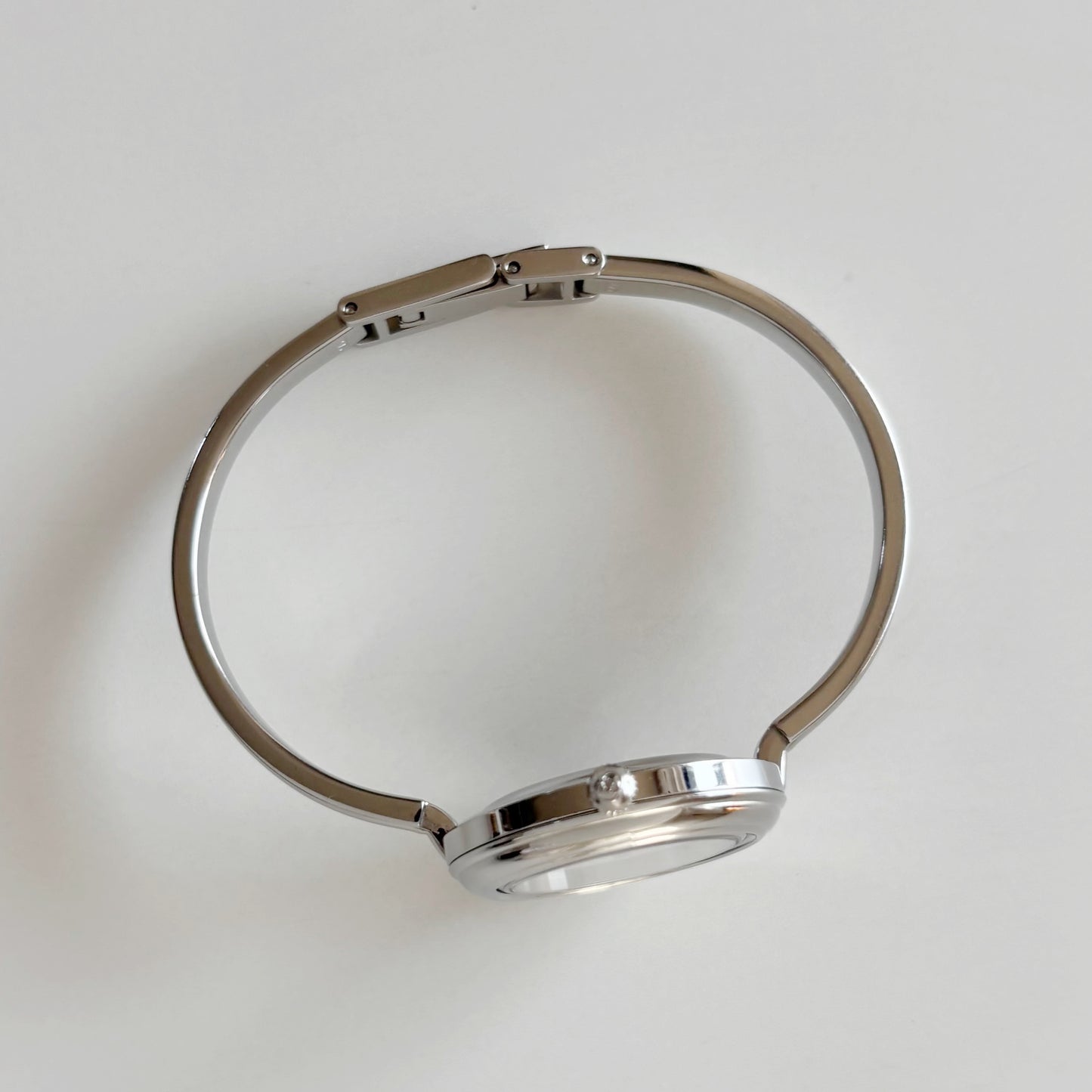 Gucci 1990s Interchangeable Bezel Stainless steel Bangle Watch with 12 bezels, case (Small)