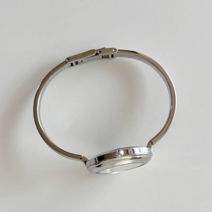 Gucci 1990s Interchangeable Bezel Stainless steel Bangle Watch with 12 bezels, case (Small)