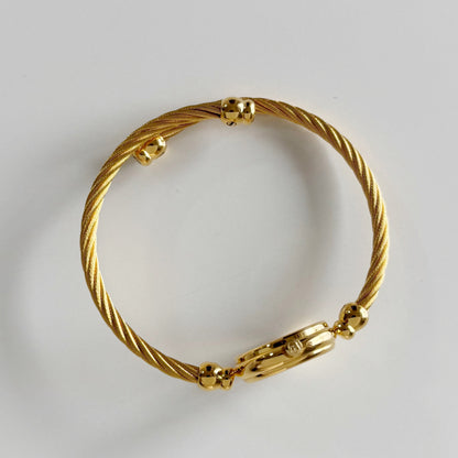Gucci 1990s Seashell Dial Gold Plated Cable Band Bangle Watch