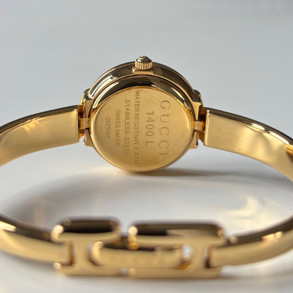 Gucci 1990s Round Dial Gold Plated Bangle Watch