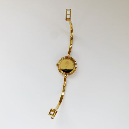 Gucci 1990s Interchangeable Bezel Gold Plated Bangle Watch with 12 bezels, case