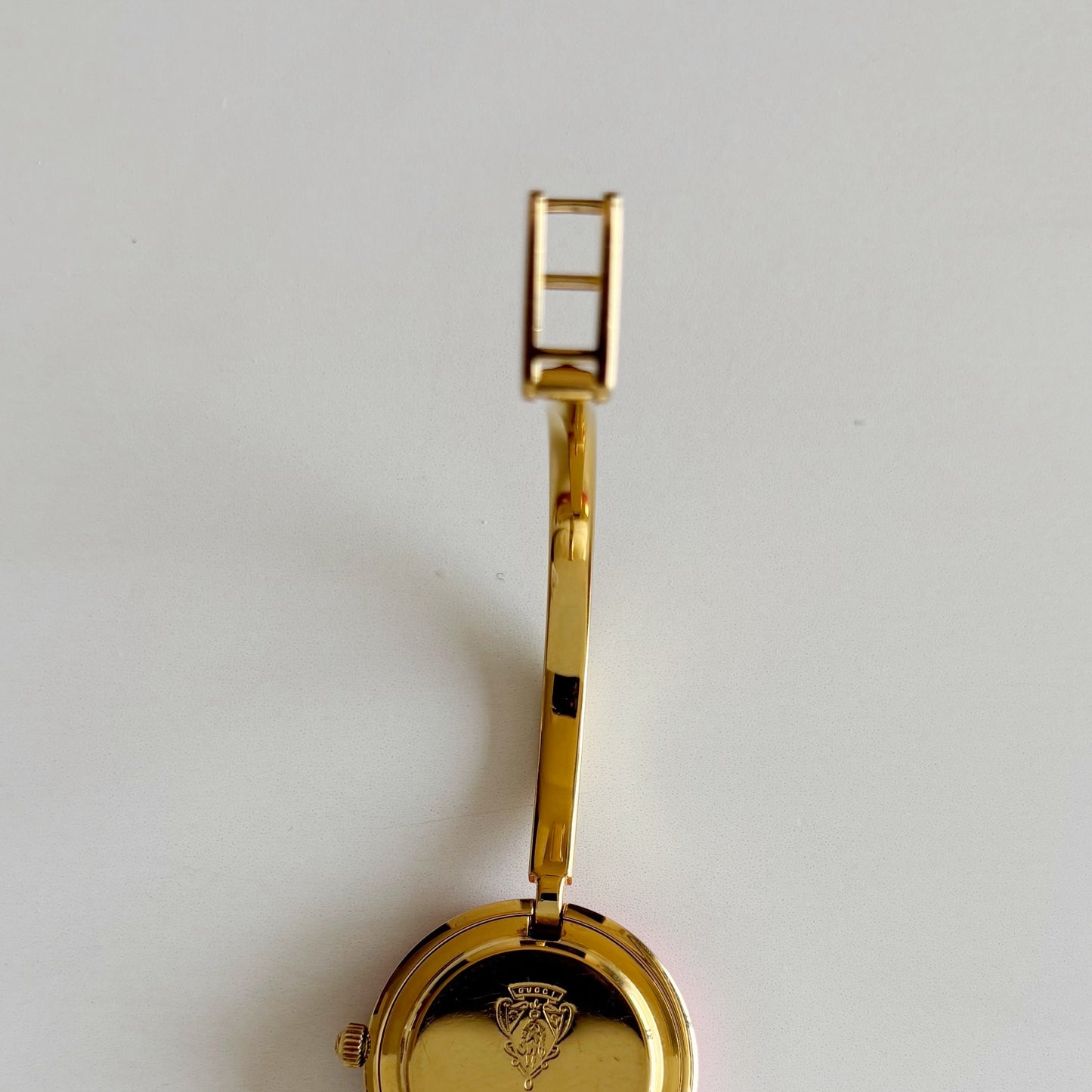 Gucci 1990s Interchangeable Bezel Gold Plated Bangle Watch with 12 bezels, case (Small)