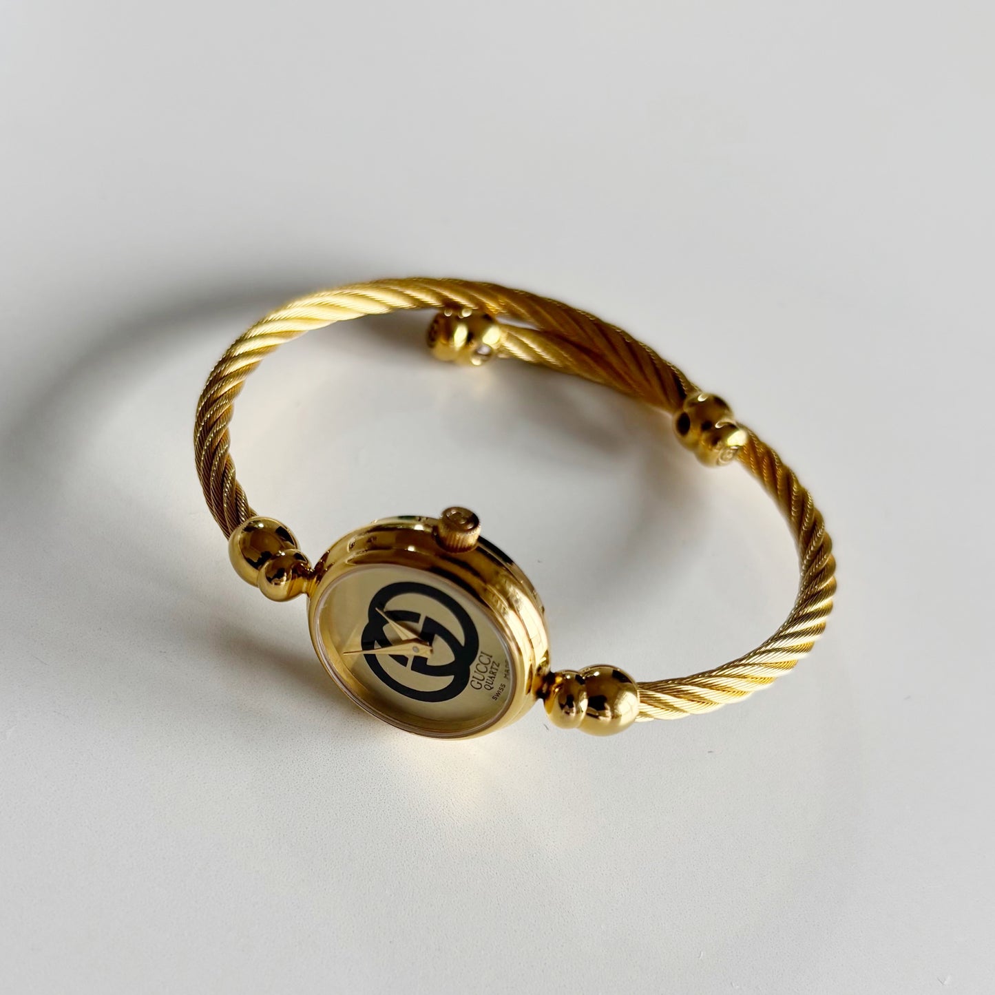 Gucci 1990s Gold Plated Cable Bangle Watch
