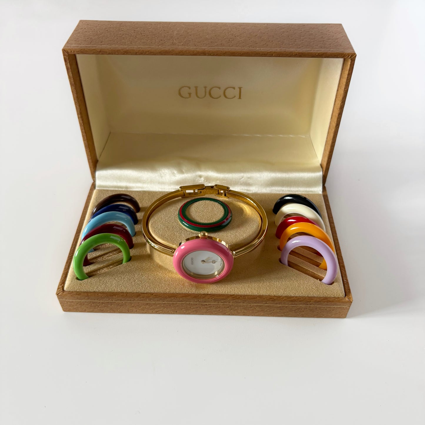 Gucci 1990s Interchangeable Bezel Gold Plated Bangle Watch with 12 bezels, case (Small)
