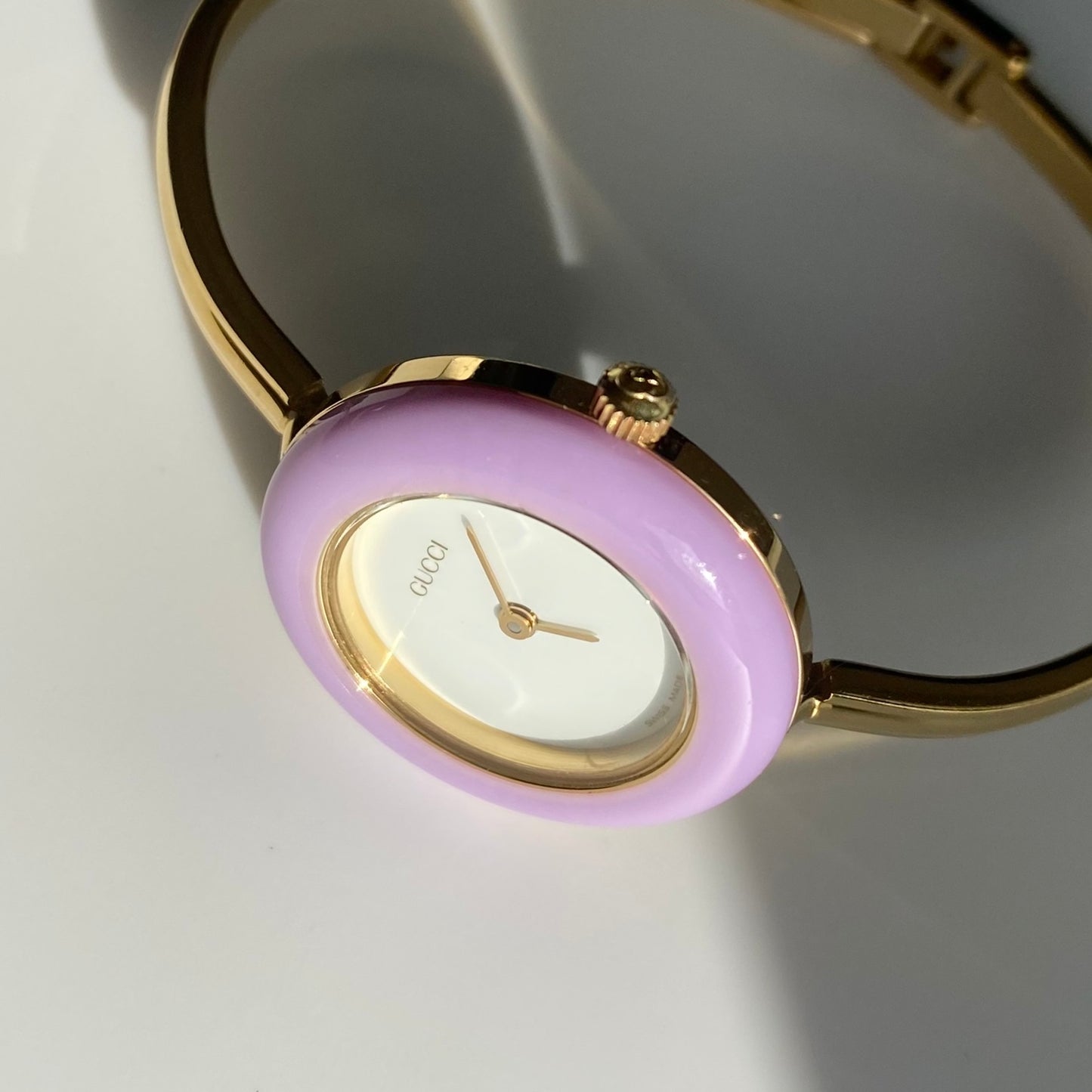 Gucci 1990s Interchangeable Bezel Gold Plated Bangle Watch with 12 bezels, case