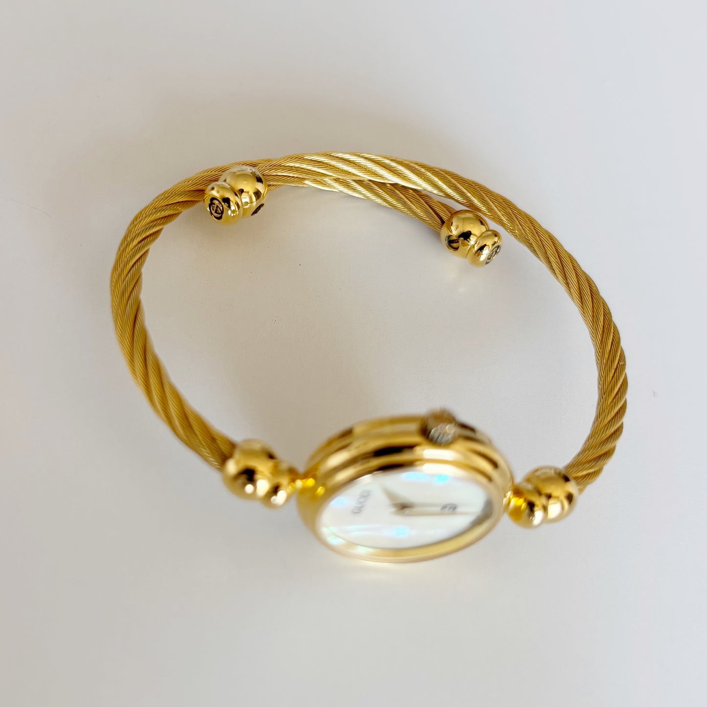 Gucci 1990s Seashell Dial Gold Plated Cable Bangle Watch