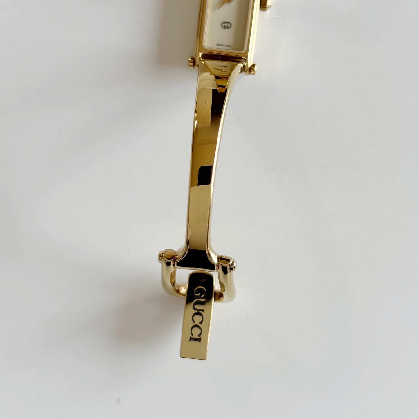Gucci 1990s Cream Dial Rectangular Gold Plated Bangle Watch