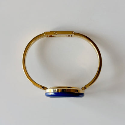 Gucci 1990s Interchangeable Bezel Gold Plated Bangle Watch with 12 bezels, case (Small)