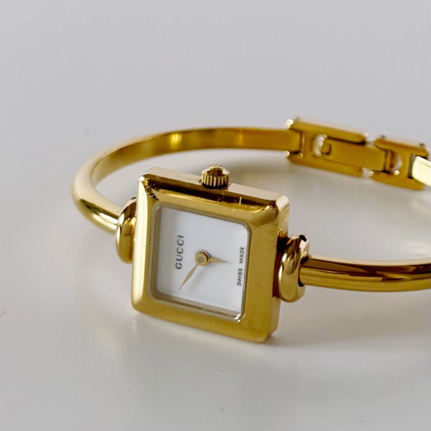 Gucci 1990s Square Dial Gold Plated Bangle Watch
