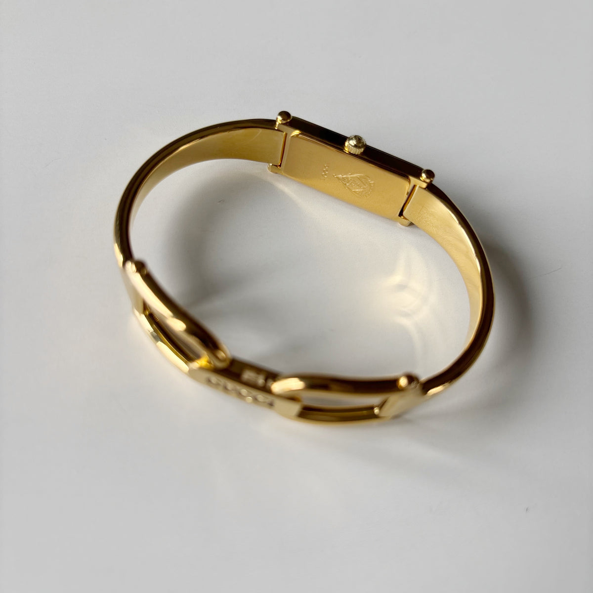 Gucci 1990s Seashell Rectangular Dial Gold Plated Bangle Watch