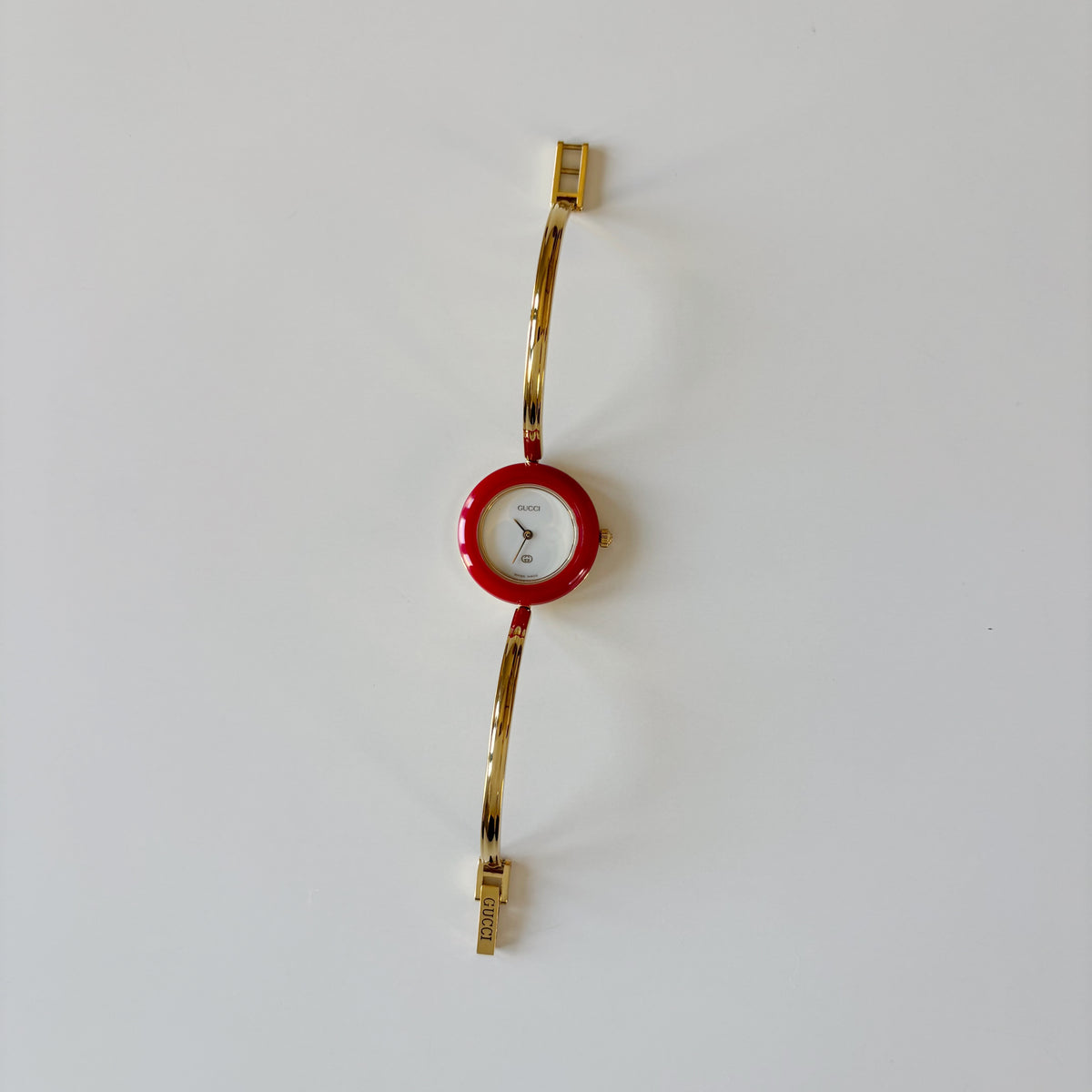 Gucci 1990s Interchangeable Bezel Gold Plated Bangle Watch with 12 bezels, case