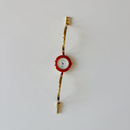 Gucci 1990s Interchangeable Bezel Gold Plated Bangle Watch with 12 bezels, case